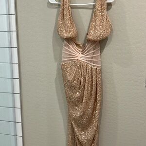 Looking to sell this dress. Never been worn. It’s beautiful